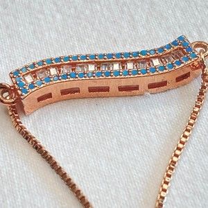 Bolo Bracelet Rose Gold Metal With Blue And Clear Stone Bar